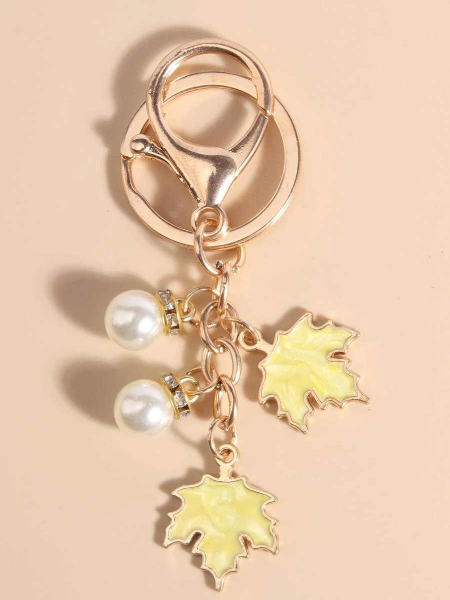 พวงกุญแจ ไข่มุก & ใบเมเปิล จี้  k-046